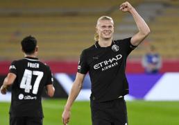 哈兰德梅开二度，曼城遭点球绝平欧冠战